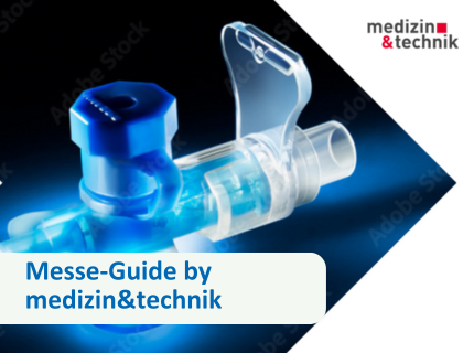 Transparente medizinische Komponente mit blauem Lichteffekt – Titelbild des Messe-Guides by medizin&technik für die Medical Technology Germany 2025.